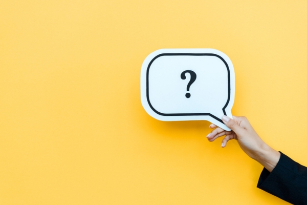 question mark on a speech bubble cutout depicting FAQs about propane