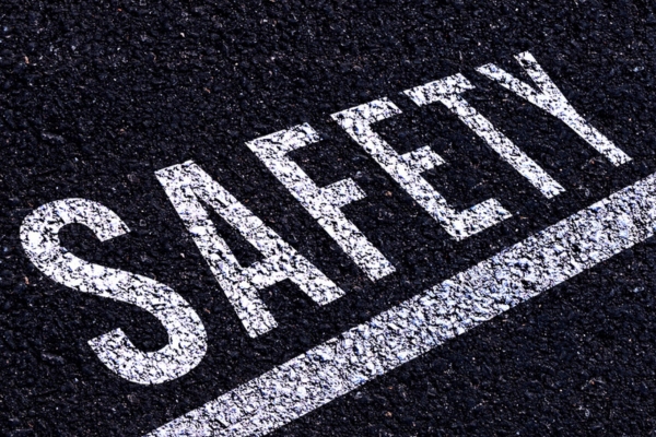 safety written on a concrete road depicting propane