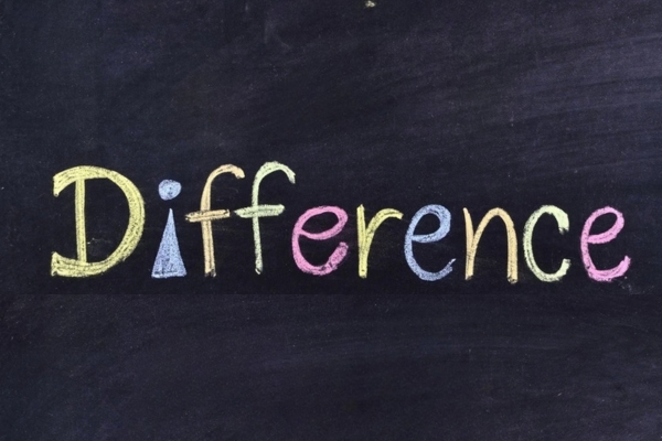 Difference written using colored chalk depicting Propane Vs. Diesel School Buses